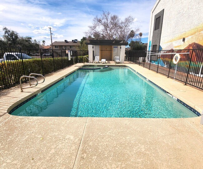 Building Photo - STUNNING TWO BEDROOMS CONDO WITH POOL CALL TODAY