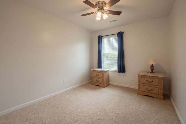 Building Photo - Partially furnished and now available!