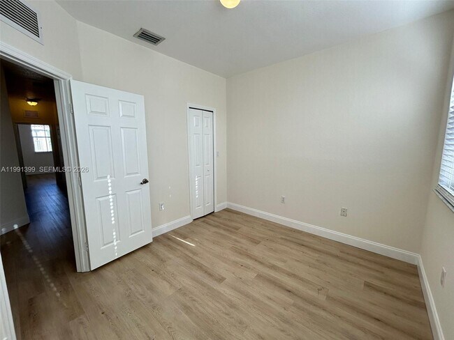 Building Photo - 12515 SW 124th Path