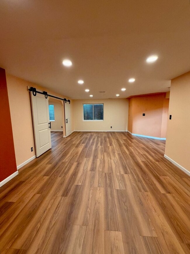 Building Photo - 5-Bed, 2.5-Bath Home Near MacIntosh Lake with Hardwood Floors, Gas Fireplace, and Finished Basement