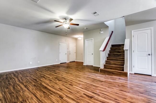 Living Room - Hardwood floors and stairway - 4917 Sanger Circle