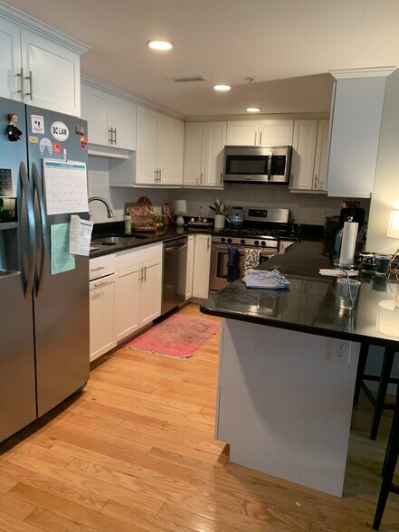 Kitchen with Breakfast Bar - 2025 Commonwealth Ave
