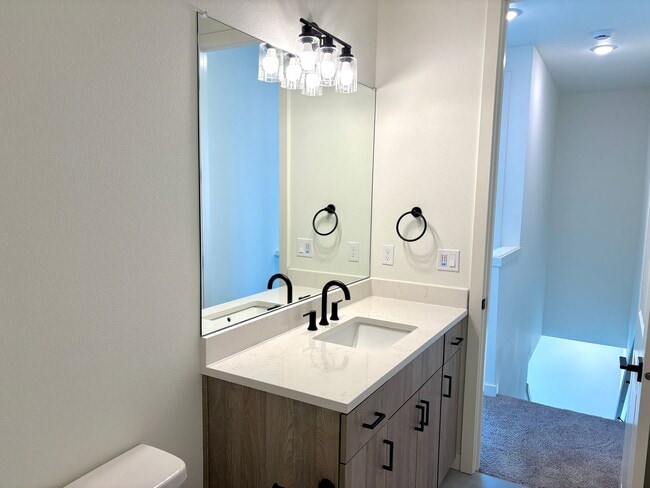 Building Photo - St. Johns New Build - Bright and Spacious End Unit 2 Bedroom with A/C, Washer/Dryer and Private P...