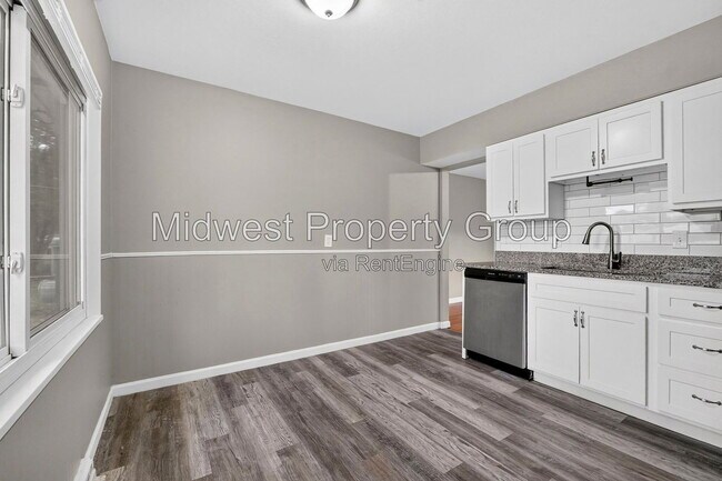 Building Photo - 6717 Lightwood Dr