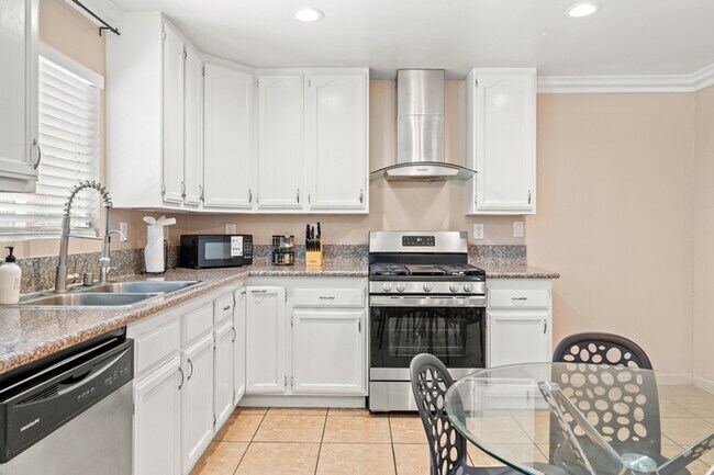 Building Photo - Fully Furnished 2BR Home with Crib — Mid-T...