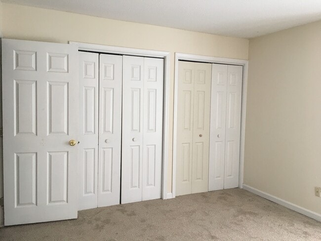 Building Photo - ONE LEVEL CONDO NEAR REX HOSPITAL -Firepla...
