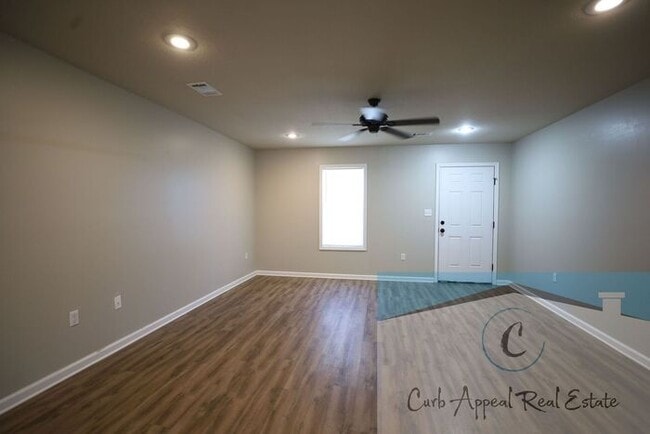 Building Photo - Move in special $800!! Luxury 2 bed, 1 bath duplex - recent construction!! Washer, dryer and inte...