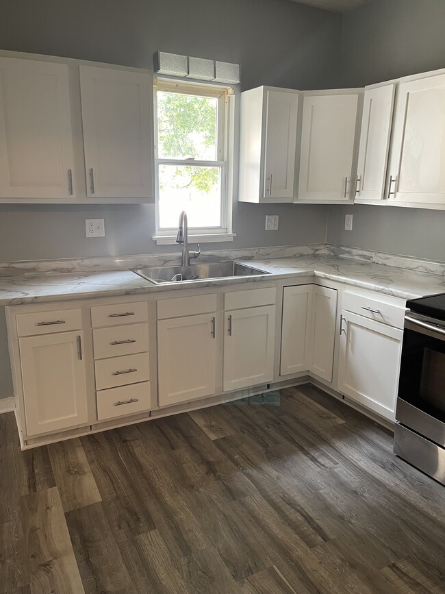 new sink, fawcett, drawer pulls - 319 N Pierce St