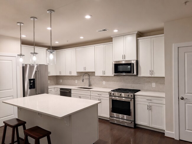 Building Photo - Sophisticated Rockville Corner Condo with Resort-Style Amenities, 2 Garage Parking Spaces