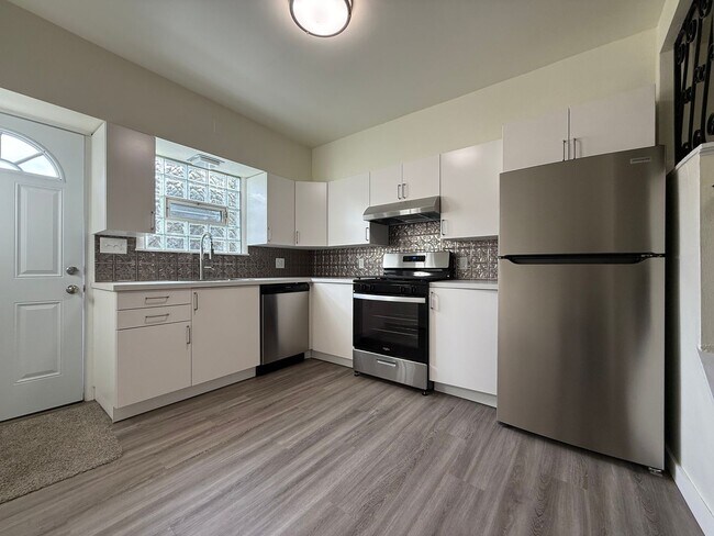 Primary Photo - Newly updated 2BR house with yard, off str...