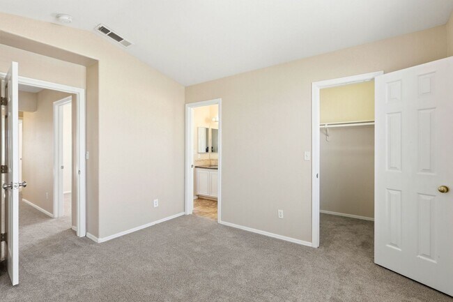 Building Photo - 4 bedroom with NO HOA! New Appliances & New Carpet!