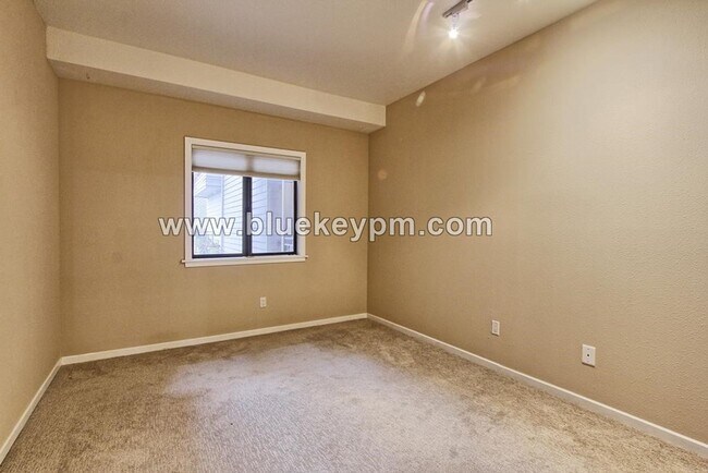 Building Photo - 2 Bed, 2 Bath Condo with Roof Top Patio, Covered Balcony and Secure Garage