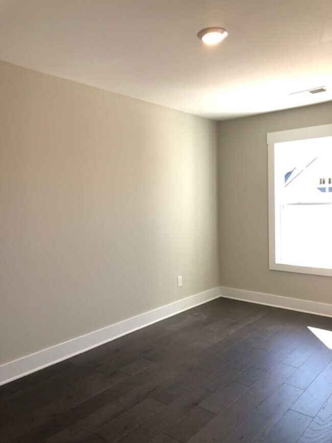 Building Photo - Brand New END UNIT North of Main St  3 mil...