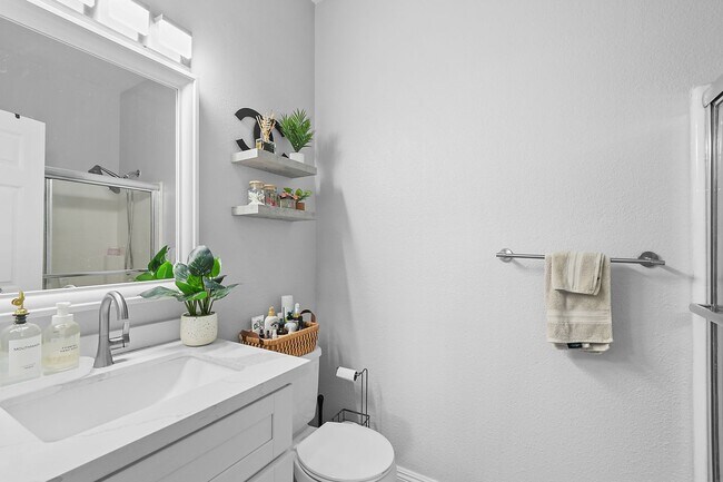 Building Photo - Remodeled River-View Corner Unit with Oversized Patio