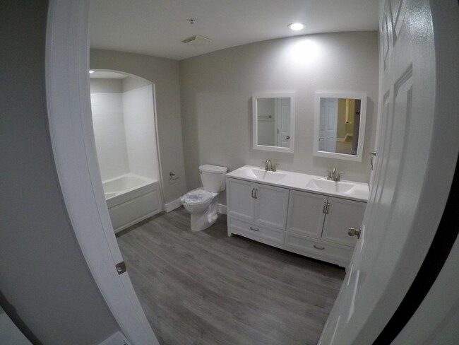 Renovated master bathroom - 322 E Central Blvd