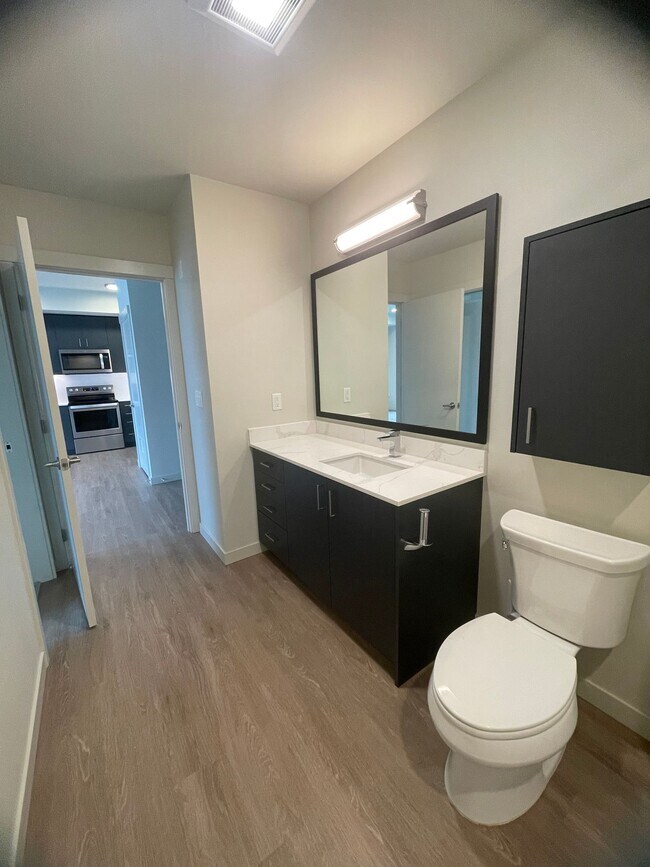Building Photo - Roomy, 612 Square Foot, 1-Bedroom Home wit...
