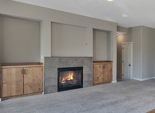 Building Photo - 2BR + 2.1BA Corner Townhome-Style Condo — Dual Primary Suites, Attached Garage & Most Utilities I...
