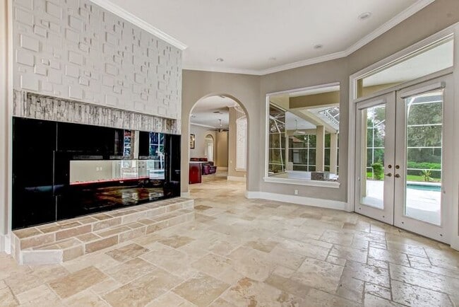 Building Photo - Stunning 5-Bedroom Pool Home on Nearly 2 A...