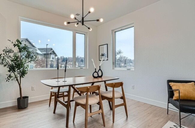 Building Photo - New Construction 3-Bedroom Townhome with Rooftop Deck & Mountain Views