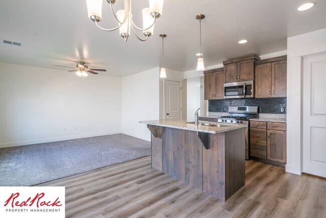 Building Photo - Adorable Stand Alone 4 Bedroom Corner Unit with Fully Fenced Backyard. Small Dogs Welcome.