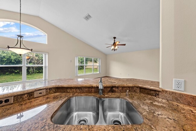 Building Photo - Immaculate 3 Bedroom Home in Gated Community - Stonefield