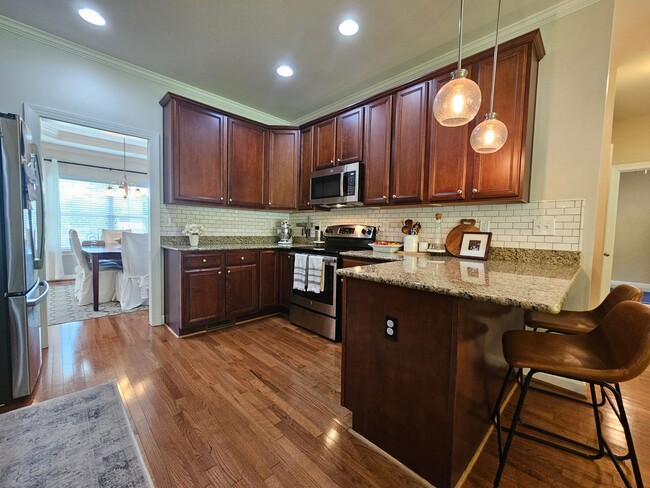 Building Photo - GRASSFIELD - Lauren's Cove