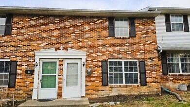 Building Photo - Introducing our cozy 2-bedroom, 1.5-bathro...