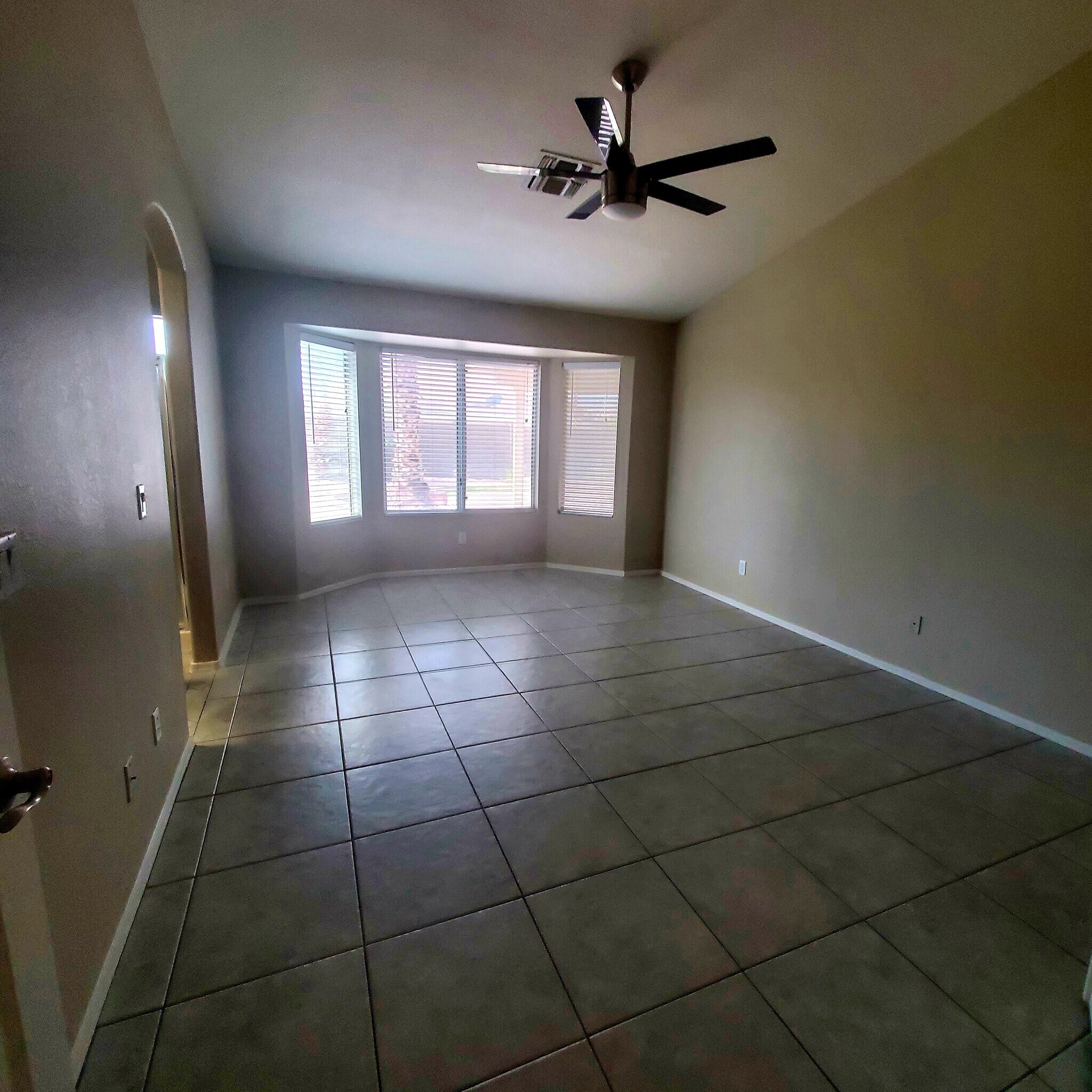 Main Bedrom has double doors and charming Bay Window overlooking the back yard. - 9139 W Davis Rd