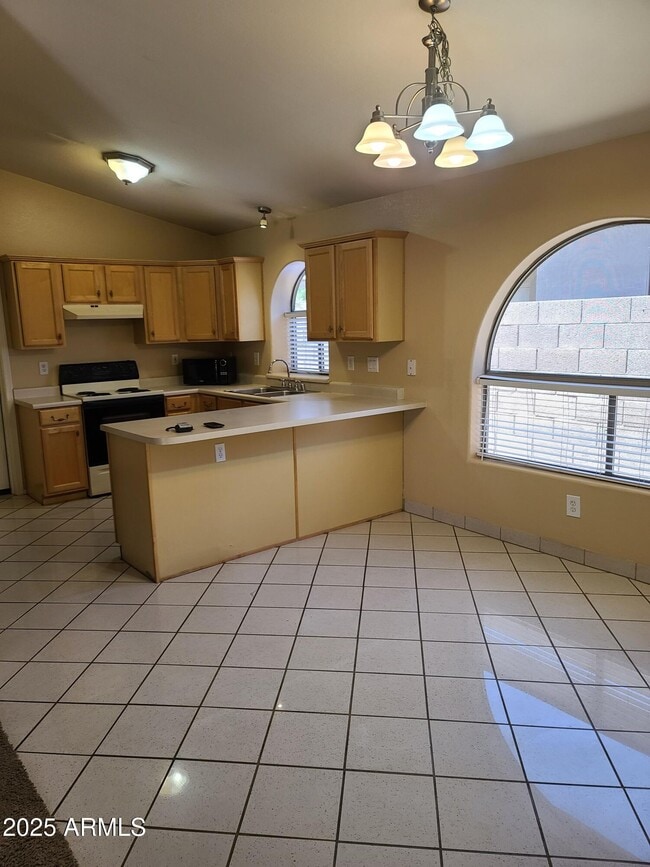 Building Photo - 9324 E Posada Ave