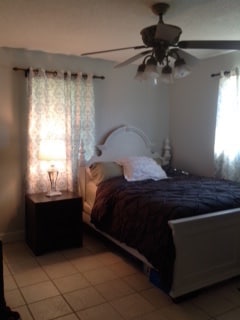 Corner bedroom with tile floor. - 6211 SW STATE ROAD 47