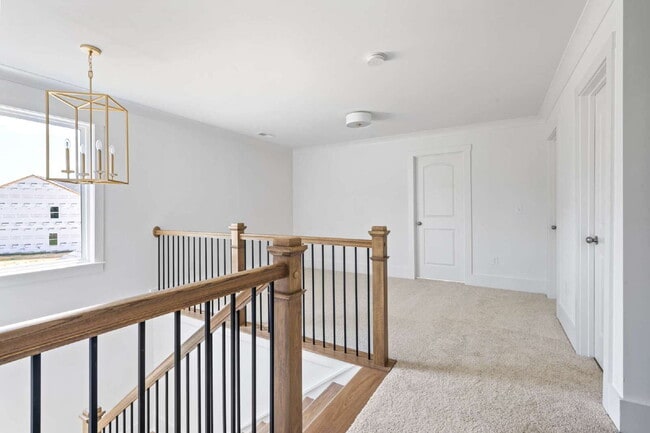 Building Photo - Experience Modern Comfort: Spacious 4-Bedr...