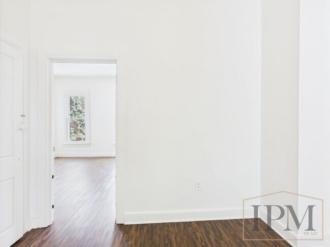 Building Photo - Available Now! Spacious 5 Bedroom Home Loc...