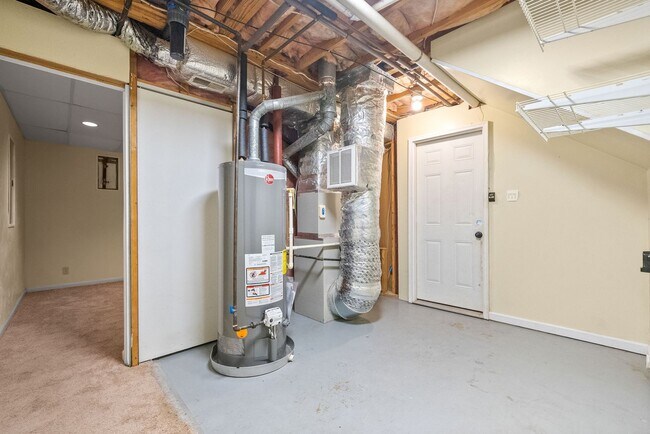 Building Photo - Pet Friendly Three Bedroom with Basement!