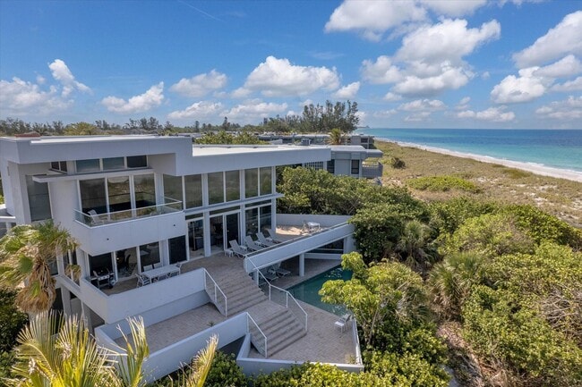 Building Photo - Beach Access & Gulf Views From This Incred...