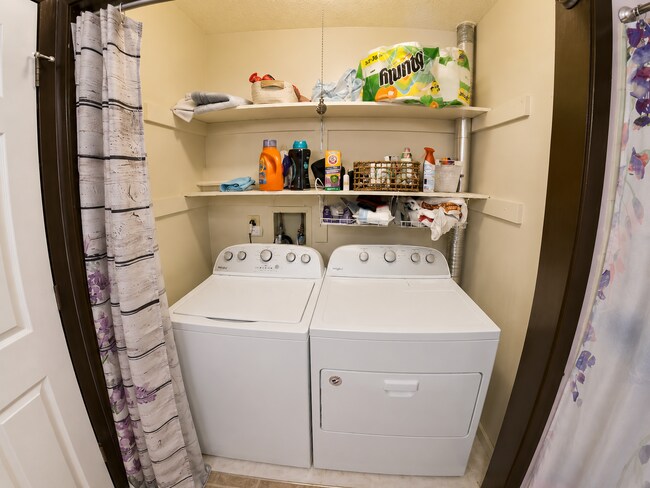 Building Photo - Indoor Balcony + Pet Friendly + Fenced In Yard + Attached Garage + Washer & Dryer Included! Avail...