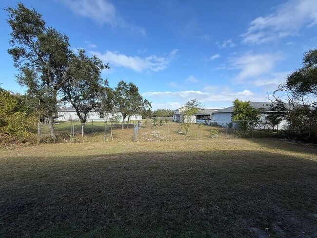 Building Photo - GORGEOUS, Large Completely Renovated Two-Story 4/2.5 PLUS LOFT in POINCIANA VILLAGES!