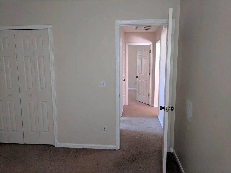 Hallway Between Bathrooms - 23996 Creek Parke Cir