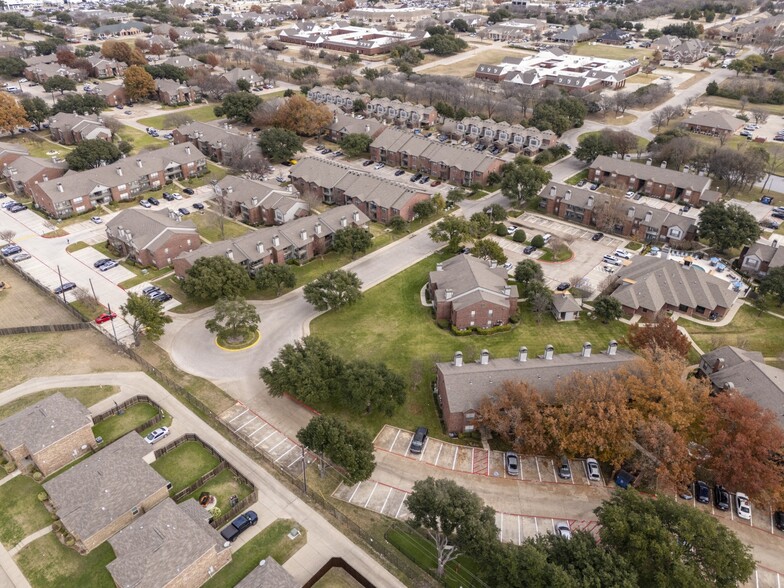 An aerial view of a neighborhood of houses in a suburb - Mount Vernon