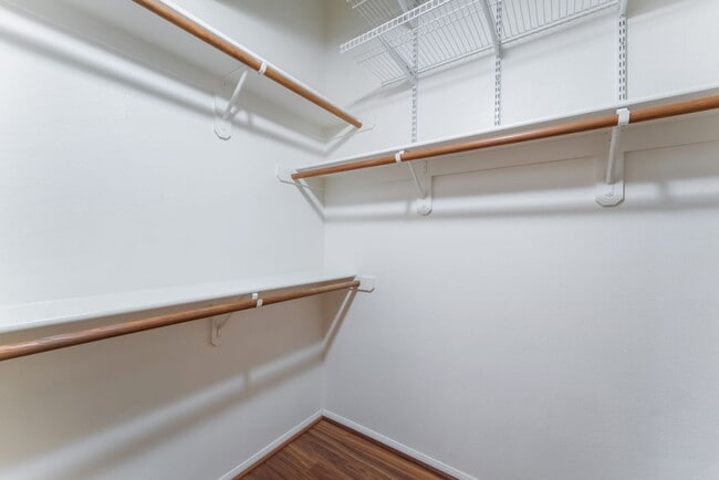 Building Photo - Charming Ground-Floor Condo with Wood Flooring & Modern Comforts!