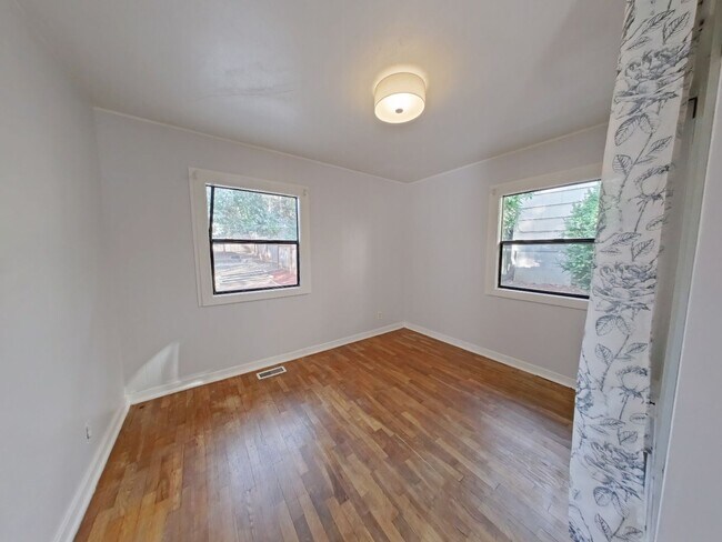 Building Photo - Charming bungalow with a large fence yard!