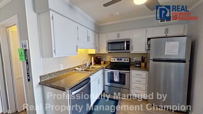Building Photo - Year Round Fully Furnished Ocean View Condo on Carolina Beach
