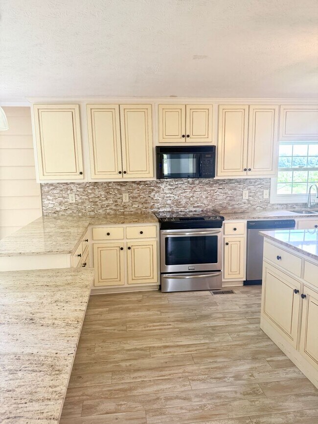 Building Photo - Hard-to-Find Home with Garage & Detached Shed & Modern Updates