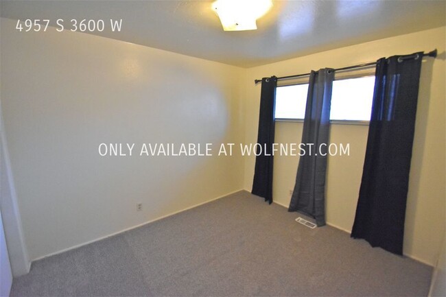 Building Photo - Updated 2 Bed Taylorsville Unit! No Deposi...