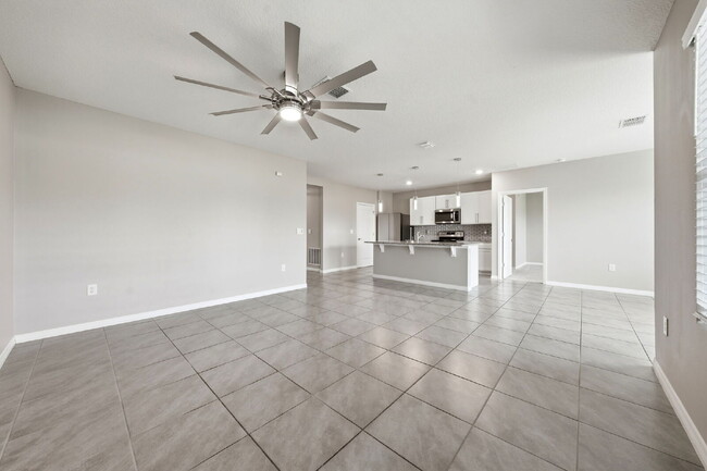 Building Photo - Three Bedroom, 2 Bathroom single family home with 2 Car Garage.