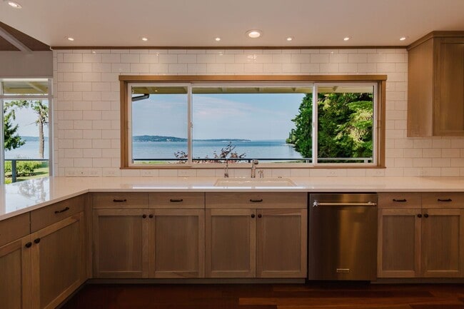 Building Photo - Low Bank Waterfront New Remodel on Huge Lot
