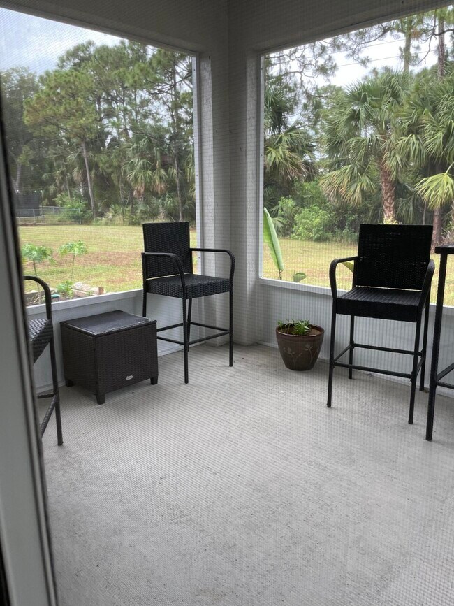 Building Photo - 6157 NW Gatun Dr