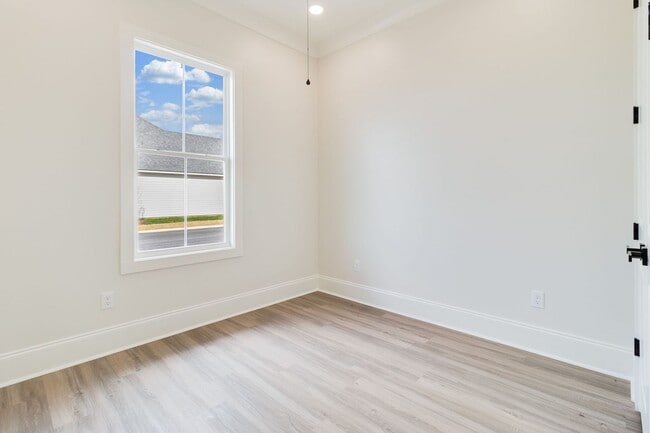 Building Photo - Brand New Upscale Single Story Townhome with private office