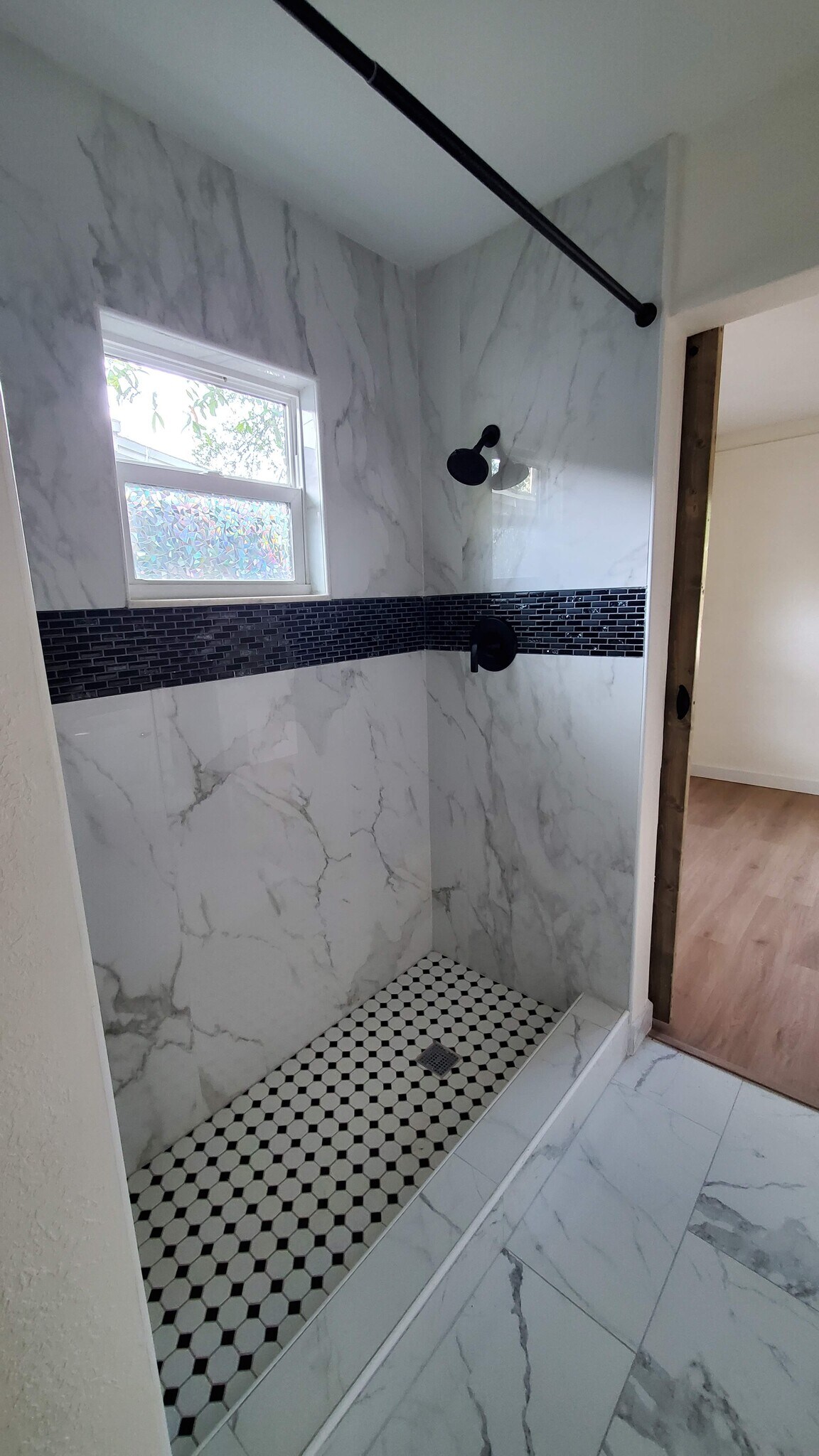 Marble-tile shower - 1134 Bay St NE