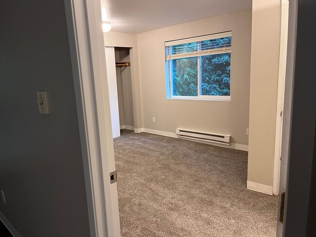 Building Photo - Beautiful Forest Views From The Top Floor and a Great Deal!! $1000 Off Your First Full Month!