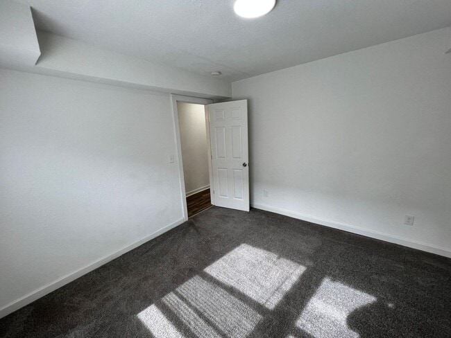 Building Photo - Updated 5BR Home with Modern Finishes & Extra Space